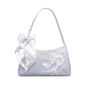 Elegant white shoulder bag with decorative floral applique on neutral grey background